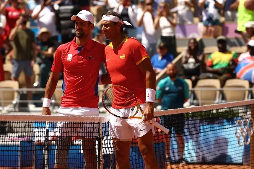 Lần đối đầu gần nhất, Djokovic đánh bại Nadal ở vòng 2 Olympic Paris. Ảnh: REUTERS Djokovic song đấu Nadal lần cuối